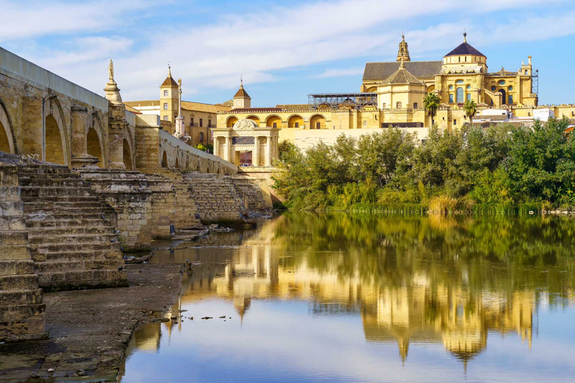 Mosque of Cordoba reflected in the Guadalquivir river